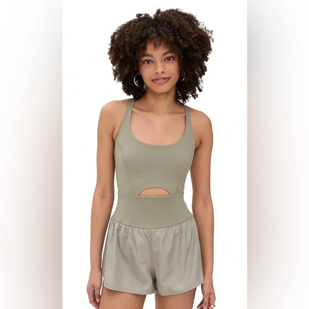 new Free People righteous runsie active romper in sage stone green
